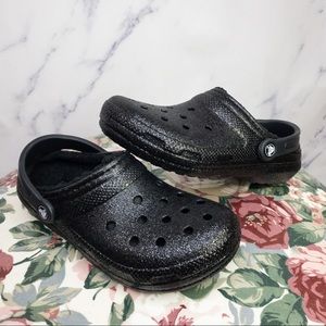 black glitter lined crocs